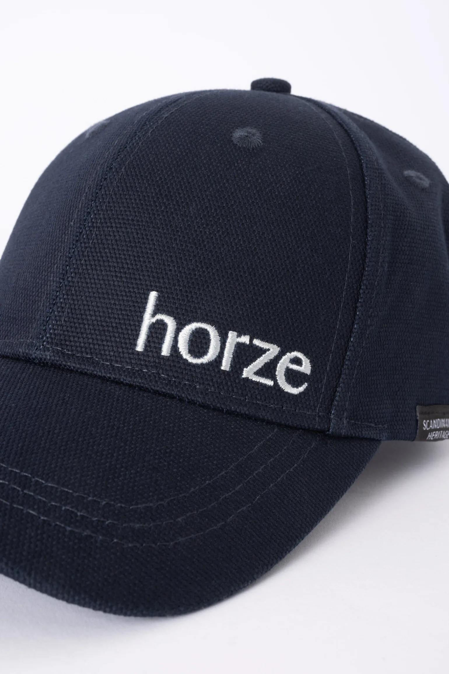 Horze caps med flagglogo
